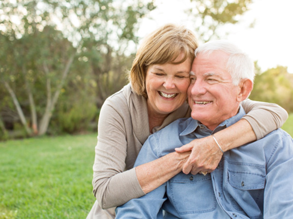 Happy Washington patient smiling with partner