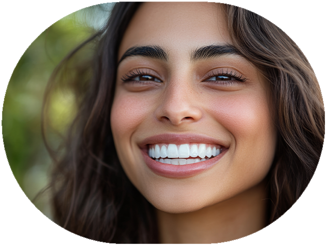 Smiling young woman in white sweater