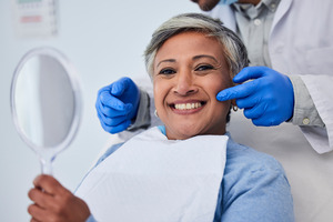 Dentist talking to a patient